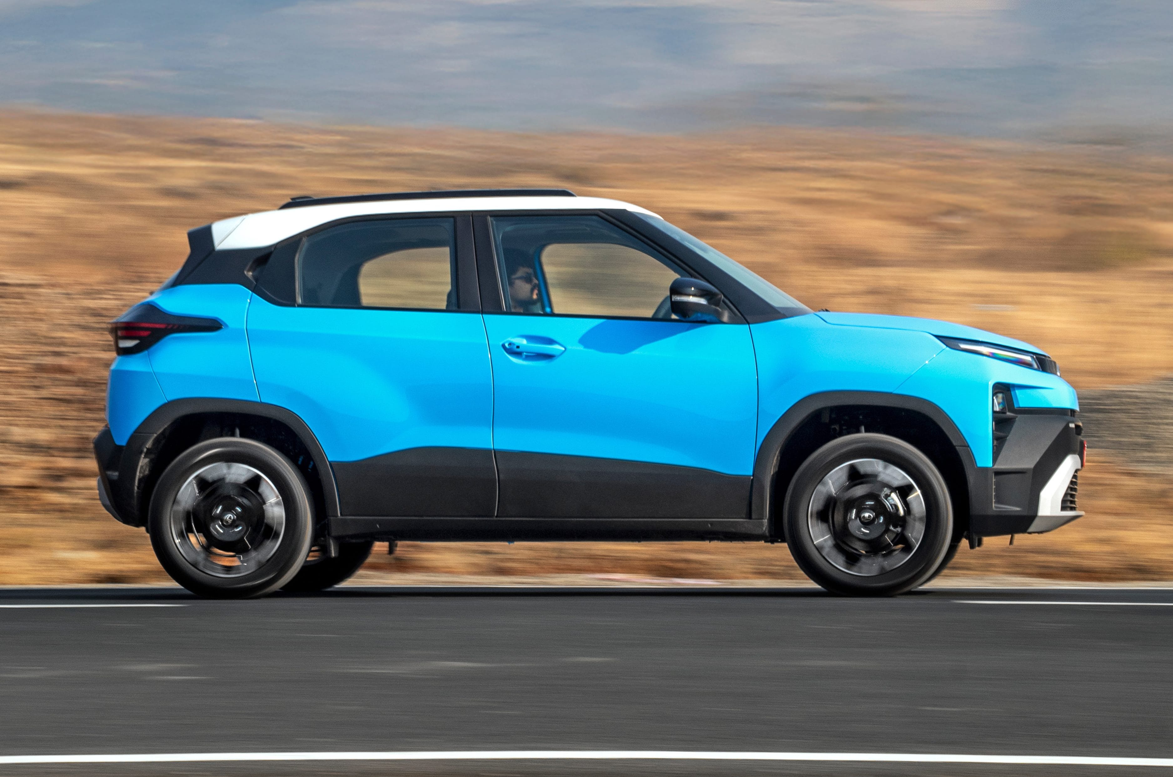 2026 Tata Punch side profile on road driving